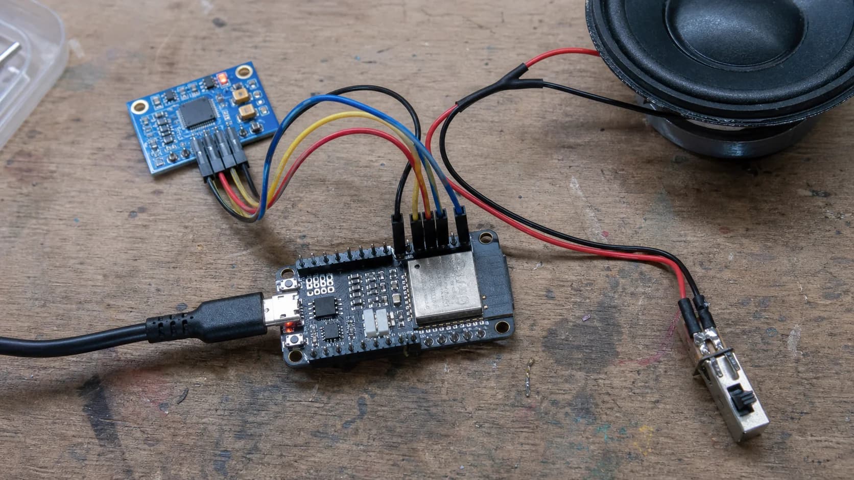 ESP32-S3 wake-word prototype with an I2S microphone, speaker, and physical microphone switch
