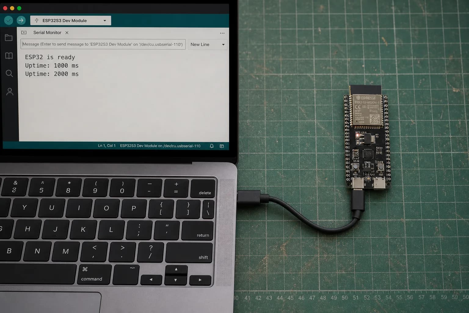 An ESP32-S3-DevKitC-1 connected to a MacBook Pro after a successful upload with activity shown in Serial Monitor.