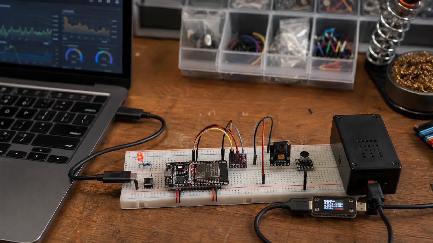 ESP32 IoT learning roadmap represented by connected prototype stages on a real electronics workbench