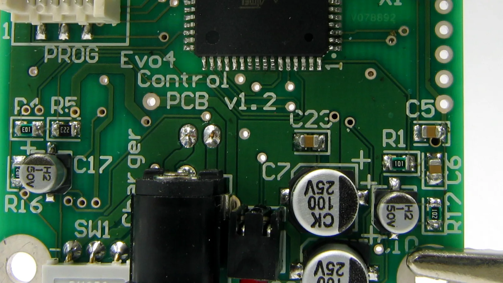 A close-up of a multi-pin IC area on an SMD circuit board