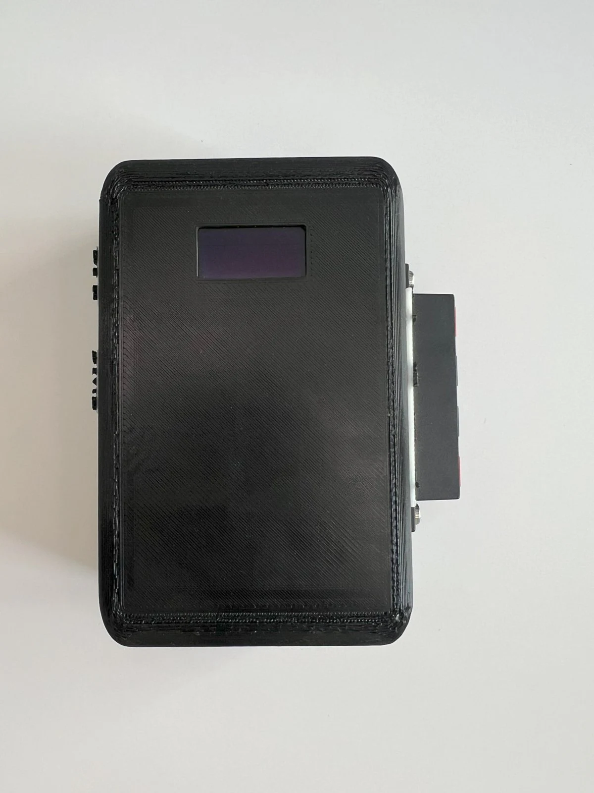 Assembled ESPiezometer device, front view with OLED display